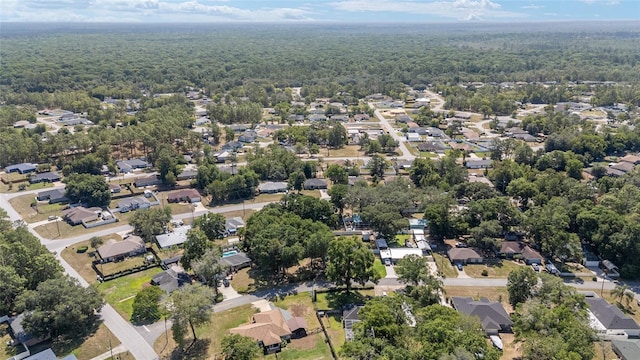 5425 Pecan Rd, Ocala, FL 34472 - aerial view of property and surrounding area featuring a heavily wooded area and nearby suburban area