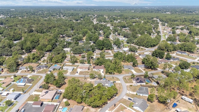 5425 Pecan Rd, Ocala, FL 34472 - aerial overview of property's location featuring a forest and nearby suburban area