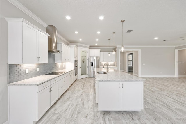 9777 SW 63rd Loop, Ocala, FL 34481 - kitchen featuring wall chimney exhaust hood, stainless steel appliances, crown molding, a center island with sink, and backsplash