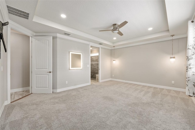 9777 SW 63rd Loop, Ocala, FL 34481 - unfurnished bedroom with a raised ceiling, light carpet, recessed lighting, baseboards, and ensuite bath