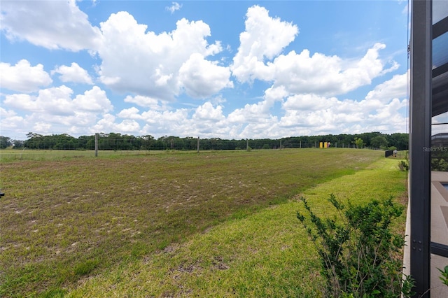 9777 SW 63rd Loop, Ocala, FL 34481 - view of green lawn featuring a view of countryside