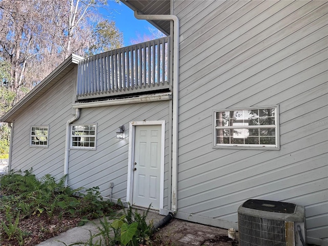 4305 SW 20th Ave, Ocala, FL 34471 - rear view of house featuring a balcony and central AC