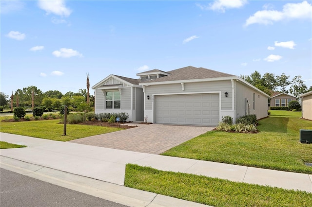 4892 NW 39th Loop, Ocala, FL 34482 - view of front of home with driveway, an attached garage, and a front yard