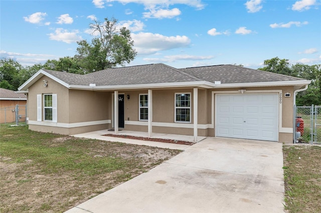 2690 SW 154th Ln, Ocala, FL 34473 - single story home featuring a porch, roof with shingles, an attached garage, and stucco siding