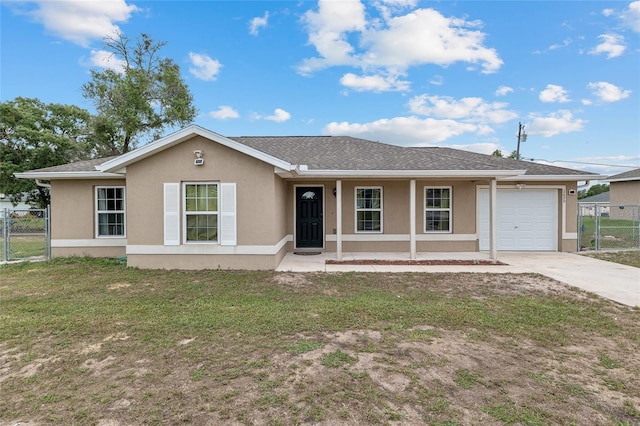 2690 SW 154th Ln, Ocala, FL 34473 - ranch-style home with an attached garage, stucco siding, covered porch, and driveway