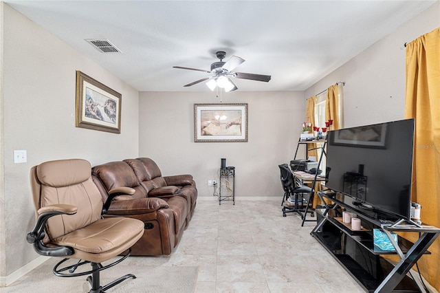 2690 SW 154th Ln, Ocala, FL 34473 - living area featuring a ceiling fan and baseboards