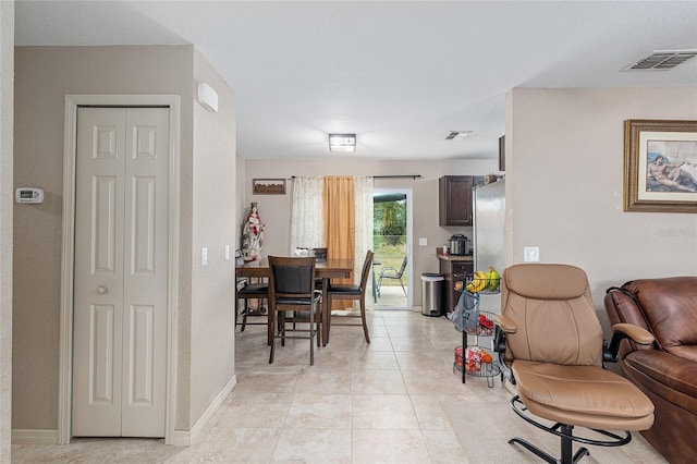2690 SW 154th Ln, Ocala, FL 34473 - dining space with light tile patterned flooring and baseboards
