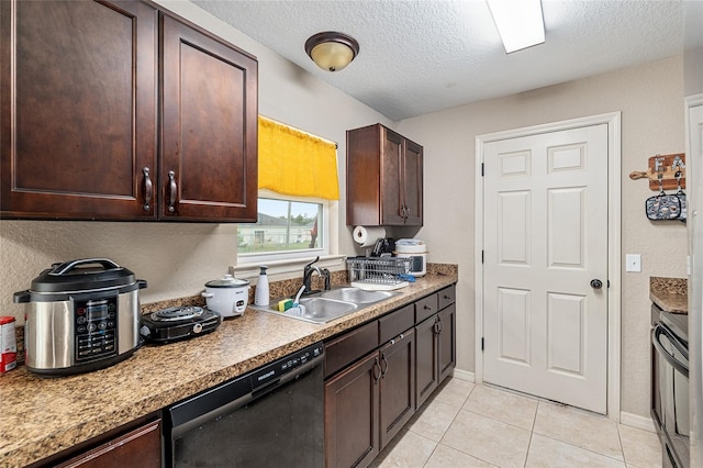 2690 SW 154th Ln, Ocala, FL 34473 - kitchen featuring black appliances, a sink, a textured ceiling, dark brown cabinets, and light tile patterned flooring