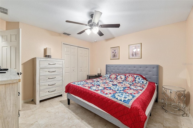 2690 SW 154th Ln, Ocala, FL 34473 - bedroom with a closet, a ceiling fan, and baseboards