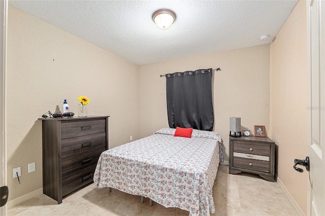 2690 SW 154th Ln, Ocala, FL 34473 - bedroom with baseboards and a textured ceiling