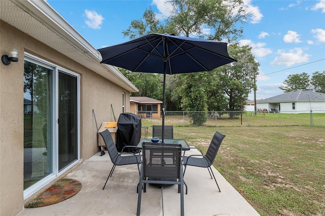 2690 SW 154th Ln, Ocala, FL 34473 - view of patio / terrace with outdoor dining space and a grill