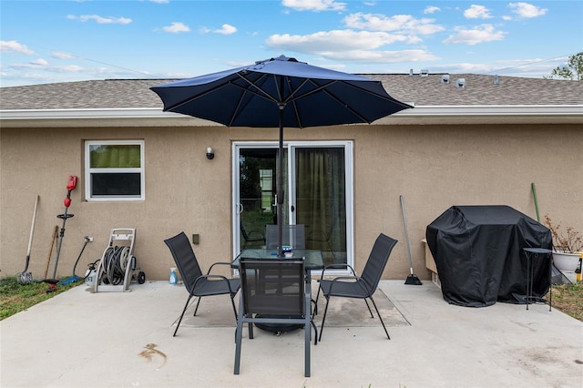 2690 SW 154th Ln, Ocala, FL 34473 - view of patio / terrace featuring a grill and outdoor dining space