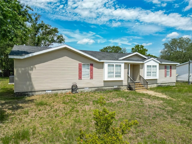 12352 SE 86th Ct, Belleview, FL 34420 - manufactured / mobile home featuring a front lawn, roof with shingles, crawl space, and entry steps