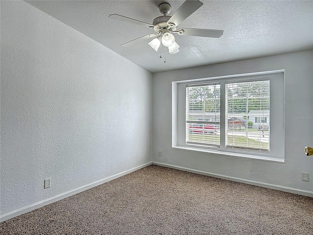 12352 SE 86th Ct, Belleview, FL 34420 - carpeted empty room with a textured wall, a textured ceiling, baseboards, and a ceiling fan