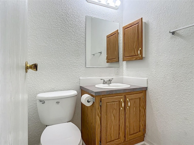 12352 SE 86th Ct, Belleview, FL 34420 - half bath featuring vanity, toilet, and a textured wall