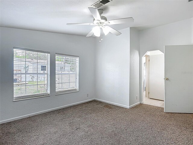 12352 SE 86th Ct, Belleview, FL 34420 - unfurnished room featuring carpet, ceiling fan, baseboards, and a textured wall