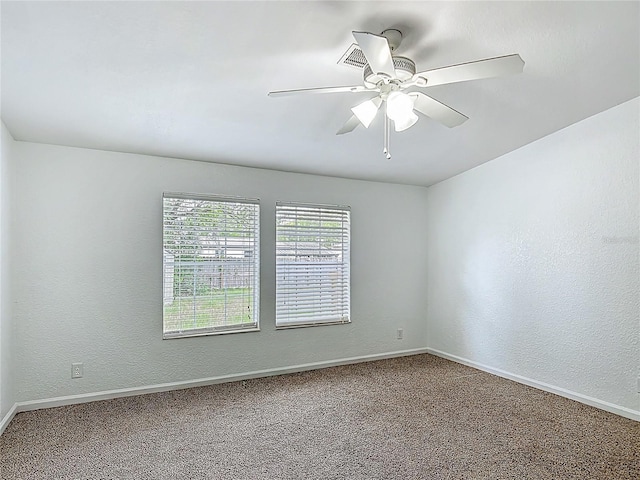 12352 SE 86th Ct, Belleview, FL 34420 - empty room with carpet, baseboards, ceiling fan, and a textured wall