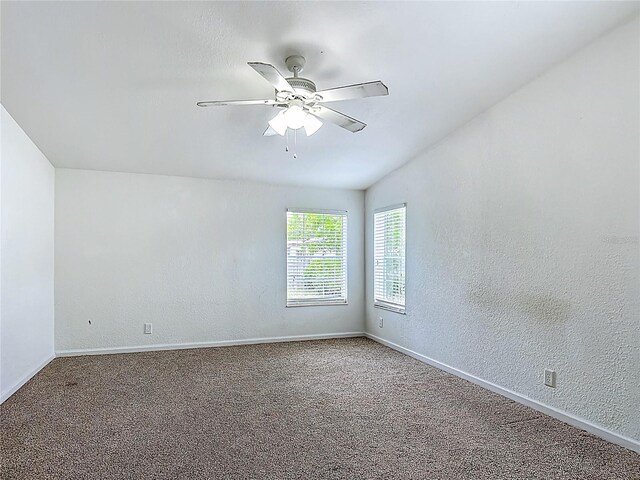 12352 SE 86th Ct, Belleview, FL 34420 - carpeted empty room with ceiling fan, baseboards, and a textured wall