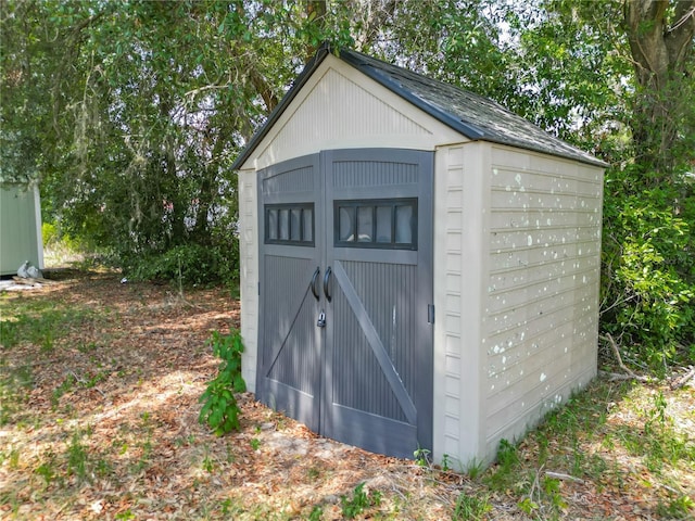 12352 SE 86th Ct, Belleview, FL 34420 - view of shed featuring view of scattered trees