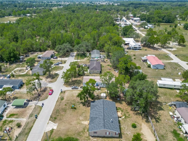 12352 SE 86th Ct, Belleview, FL 34420 - aerial overview of property's location with a forest and nearby suburban area