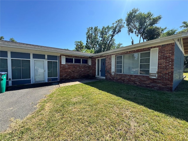 4000 SW 6th Ave, Ocala, FL 34471 - view of front facade with brick siding and a front yard
