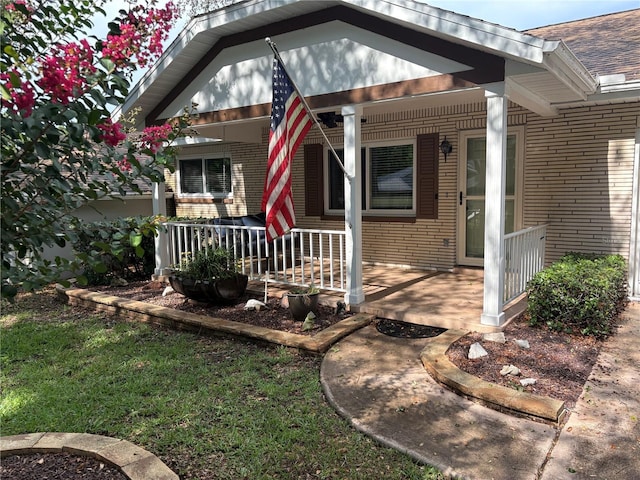 9801 SW 88th Ter Unit B, Ocala, FL 34481 - entrance to property with covered porch and brick siding