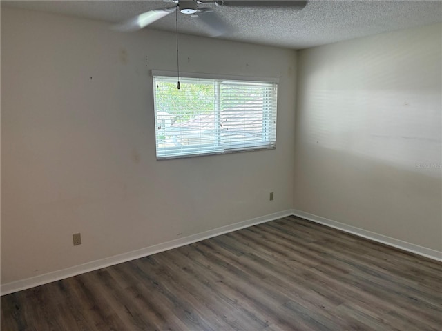 9801 SW 88th Ter Unit B, Ocala, FL 34481 - empty room with a ceiling fan, dark wood-type flooring, a textured ceiling, and baseboards