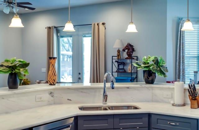10208 SE 170th Pl, Summerfield, FL 34491 - kitchen with a sink, dishwashing machine, plenty of natural light, and light countertops