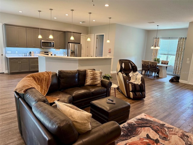 10208 SE 170th Pl, Summerfield, FL 34491 - living area with wood finished floors, baseboards, and recessed lighting