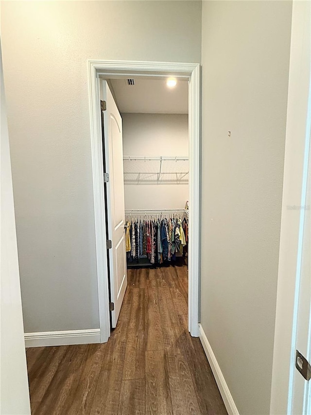 10208 SE 170th Pl, Summerfield, FL 34491 - walk in closet featuring wood finished floors