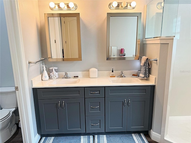 10208 SE 170th Pl, Summerfield, FL 34491 - full bath with toilet, double vanity, and baseboards