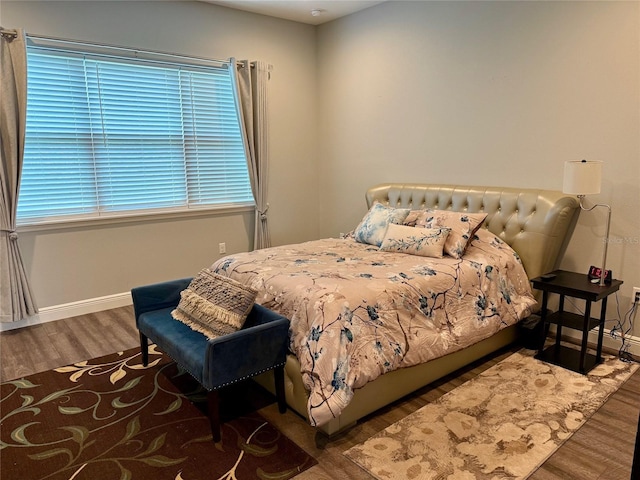 10208 SE 170th Pl, Summerfield, FL 34491 - bedroom featuring wood finished floors and baseboards