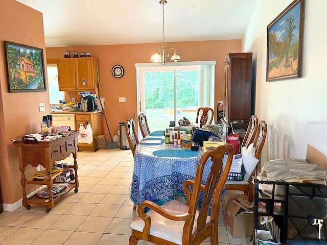 14 Dogwood Drive Radl, Ocala, FL 34472 - dining space featuring a chandelier, light tile patterned floors, and baseboards