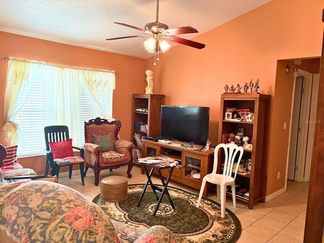 14 Dogwood Drive Radl, Ocala, FL 34472 - living area featuring light tile patterned flooring, a ceiling fan, a textured ceiling, and lofted ceiling