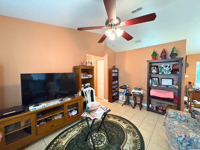 14 Dogwood Drive Radl, Ocala, FL 34472 - living room featuring a ceiling fan, light tile patterned flooring, and vaulted ceiling