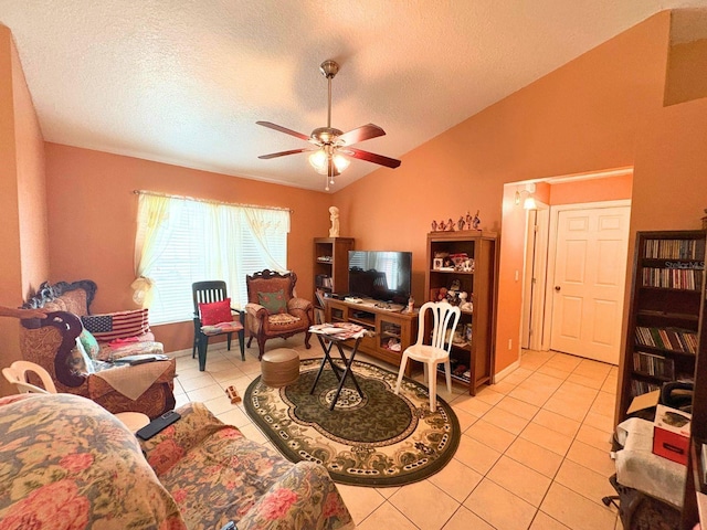 14 Dogwood Drive Radl, Ocala, FL 34472 - living room featuring light tile patterned flooring, lofted ceiling, a textured ceiling, a ceiling fan, and baseboards
