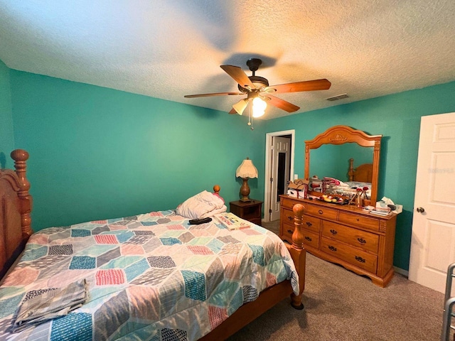 14 Dogwood Drive Radl, Ocala, FL 34472 - bedroom with a textured ceiling, carpet, and a ceiling fan