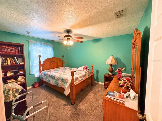 14 Dogwood Drive Radl, Ocala, FL 34472 - bedroom featuring carpet flooring, a ceiling fan, a textured ceiling, and baseboards