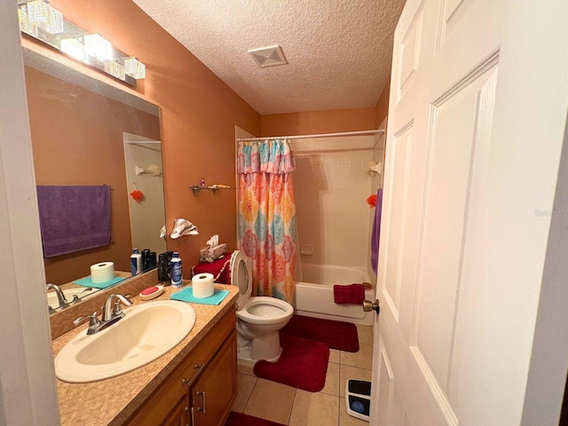 14 Dogwood Drive Radl, Ocala, FL 34472 - full bath with vanity, toilet, tile patterned floors, a textured ceiling, and shower / bath combo
