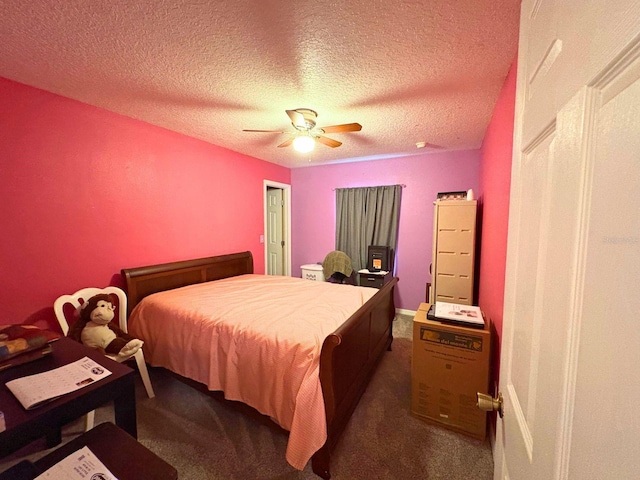 14 Dogwood Drive Radl, Ocala, FL 34472 - bedroom with dark colored carpet, a textured ceiling, and ceiling fan