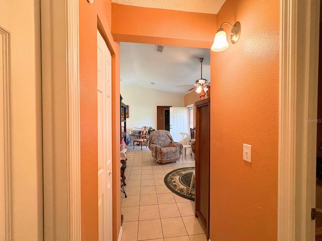 14 Dogwood Drive Radl, Ocala, FL 34472 - hall with light tile patterned flooring, vaulted ceiling, and a textured wall