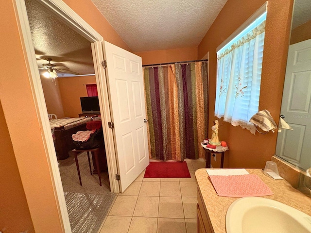 14 Dogwood Drive Radl, Ocala, FL 34472 - bathroom featuring a textured ceiling, vanity, a ceiling fan, tile patterned flooring, and a shower with shower curtain