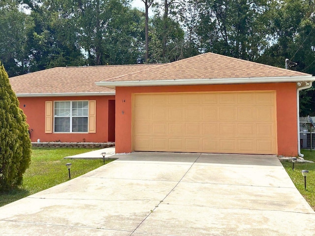 14 Dogwood Drive Radl, Ocala, FL 34472 - ranch-style house with stucco siding, driveway, an attached garage, and a front lawn