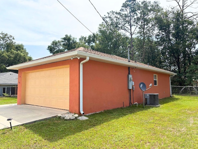 14 Dogwood Drive Radl, Ocala, FL 34472 - view of home's exterior with stucco siding, a garage, and cooling unit