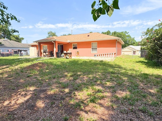 14 Dogwood Drive Radl, Ocala, FL 34472 - back of property with stucco siding and a patio