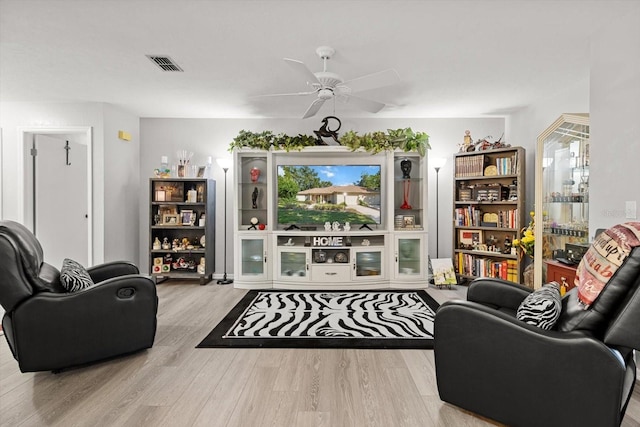 1631 W Dalary Pt Unit 1631, Crystal River, FL 34429 - living area featuring ceiling fan and wood finished floors