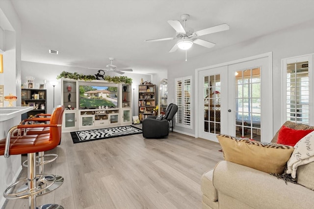 1631 W Dalary Pt Unit 1631, Crystal River, FL 34429 - living area with french doors, ceiling fan, and wood finished floors