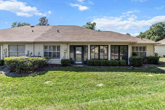 1631 W Dalary Pt Unit 1631, Crystal River, FL 34429 - view of front of property with a front lawn, stucco siding, and roof with shingles