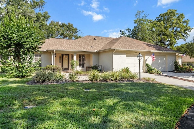 1631 W Dalary Pt Unit 1631, Crystal River, FL 34429 - single story home featuring stucco siding, a garage, a front lawn, driveway, and a shingled roof