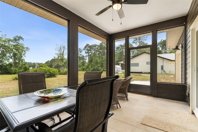 283 Riley Lake Dr, Hawthorne, FL 32640 - sunroom with outdoor dining space and a ceiling fan